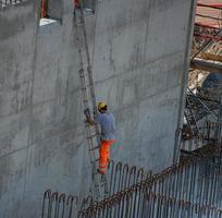 Bergamo Italy April 2018 workers at work for the construction of the sewage treatment plant photo