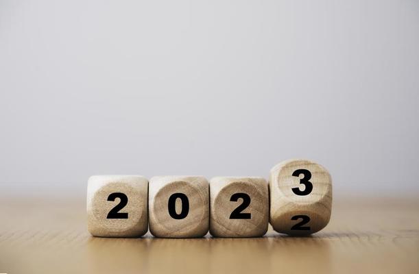 Hand Flipping Of 2023 To 2024 On Wooden Block Cube For Preparation