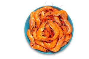 Top view of shrimp in blue dish isolated on white background with clipping path. photo