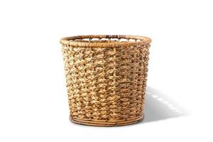 Empty wicker basket isolated on a white background with clipping path. Front view. Water hyacinth basket. photo