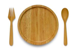 Top view of empty wooden plate, spoon and fork isolated on white background with clipping path. photo