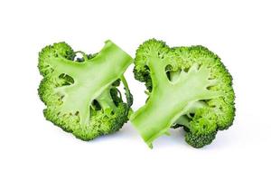 Fresh broccoli blocks isolated on white background photo