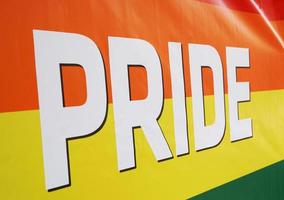 close-up rainbow flag at gay pride event photo