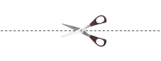 paper scissors cutting along broken line photo