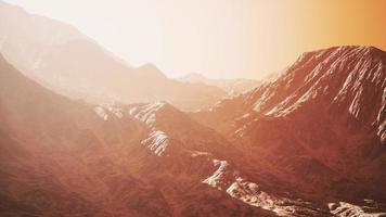 the sun rays illuminate the beautiful panorama of the Carpathian mountains photo