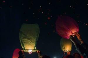 Letting go of the lanterns at night photo