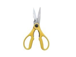 yellow handle scissors on a white background photo