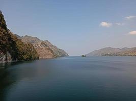 The bay is surrounded by mountains photo