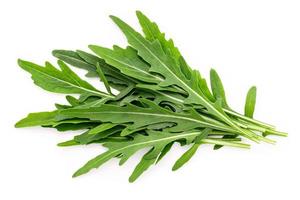 Arugula leaves isolated on white background. Closeup fresh wild rocket leaves on white background top view. photo