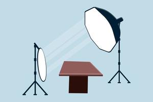 Illustration Vector Graphic flat style of photo equipment in photography studio with lamp, reflector and table. Suitable for studios, small businesses and more about Scene from the studio