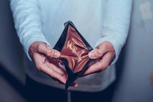 negocio de hacer dinero de mano y billetera foto