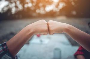 The hands of two people represent unity in work. Successful Business To be a good team photo