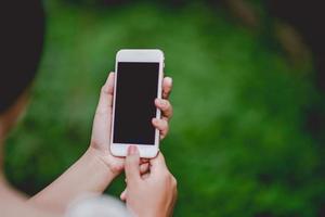 Hands and phones Telephones The use of communication technology. Of new businessmen And to do business online. photo
