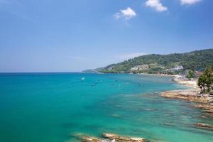 Aerial view drone shot of Kalim beach Phuket Thailand in March 11- 2022 Amazing beach beautiful sea in andaman sea Aerial view Drone camera High angle view. photo