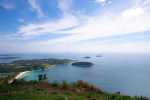 scenery landscape view Phahindum view point popular landmark in Phuket Thailand Viewpoint to see promthep cape, Naiharn beach and yanui beach beautiful andaman sea in Phuket Thailand photo