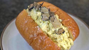 bun or bread with scrambled eggs and truffle mushroom video