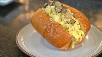 bun or bread with scrambled eggs and truffle mushroom video