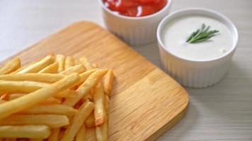 French fries or potato chips with sour cream and ketchup video