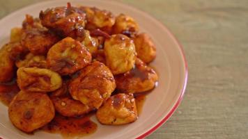 fried meatballs with spicy dipping sauce - Thai street food style video