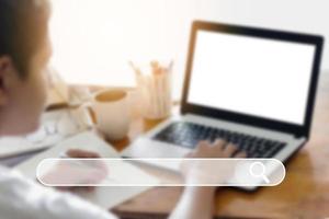 Searching Browsing Internet Data Information with blank search bar.businessman working with smart phone, tablet and laptop computer on desk in office. Networking Concept. photo