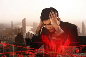 Business asian man stress from corona virus outbreak about world finance. photo