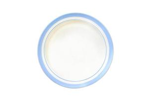 Top down white round deep ceramic soup plate with blue edges top view on isolated background with space for text. Copy space. Minimal style. Concept layout for labeling and food placement. Mockup. photo