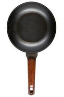 black cast iron frying pan with wooden handle top view isolated on a white background without shadows. the concept of the kitchen, cooking, food preparation, mock up. space for text. photo