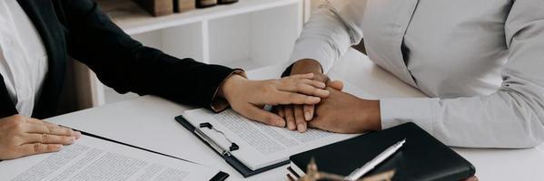 Lawyer is counseling the client in his counsel and will not escape the lawsuit. photo