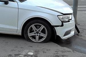 The car crashed into a street pole.Car accident insurance photo