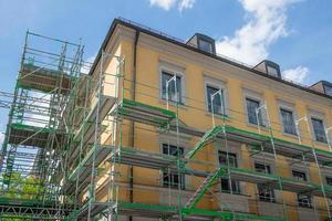 Scaffolding for building renovation in Munich city center photo