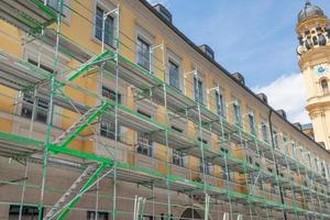 Scaffolding for building renovation in Munich city center photo