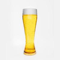 Draft or craft beer in a clear glass with beer foam and bubbles in the glass. Cold alcoholic beverages are popular around the world. On a white background 3D Rendering photo