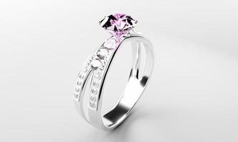 el gran diamante rosa está rodeado de muchos diamantes en el anillo de oro platino colocado sobre un fondo gris. Elegante anillo de bodas con diamantes para mujer. representación 3d