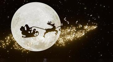 Silhouette Santa and Reindeer with golden magic sparkle flying in the dark sky with full moon and many stars. Concept for christmas eve.