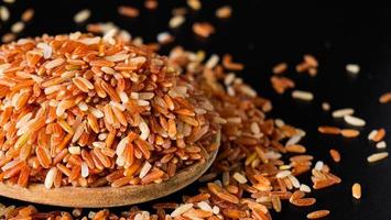 Rice grain varieties Red Jasmine Rice or Red Brown Rice. New native variety of Thailand. Vitamin B helps to treat allergies. And does not cause allergic reactions Suitable for patients with anemia. photo