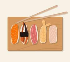 Set of traditional Japanese dishes of rolls and sushi with seafood. On a wooden tray vector