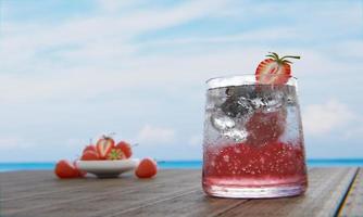 el néctar de fresas sin alcohol con soda no mezcla alcohol. las fresas frescas en una taza de cerámica están en el desenfoque de fondo colocadas en una mesa de madera. el restaurante en la playa y el mar .3d renderizado foto