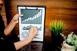 Work Desk Home Hand of the Worker Graph Paper Business Success With copy space photo
