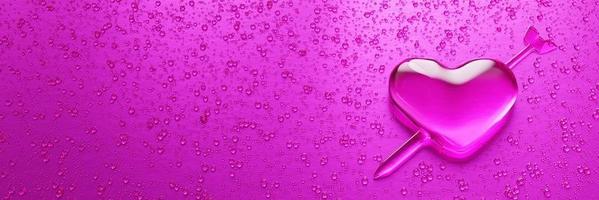 gotitas de agua en forma de corazón con flecha bordada en el significado del amor. un montón de gotas en superficies metálicas en tonos rosa y rosa oscuro para fondo móvil o papel tapiz. representación 3d. foto
