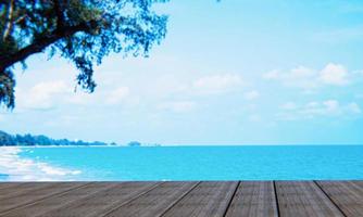 A wooden surface or table for taking pictures with a view of the sea, waves, bays and pine trees. 3D Rendering photo