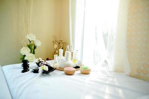 A beautiful spa element on a white fabric floor called a couch. Health Spa Equipment photo