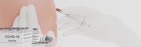 Vaccination vial for protection against Covid-19 or coronavirus. Blur medical worker in white rubber gloves holds Syringe and Vaccine.  Prepare to inject into the shoulder or upper arm. 3D Rendering photo