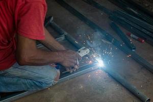 welder worker welding metal photo