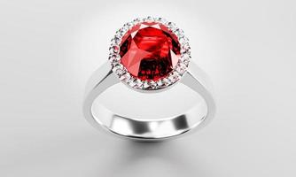 The large oval red diamond is surrounded by many diamonds on the ring made of platinum gold placed on gray background. 3d rendering photo