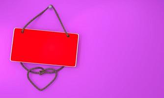 A red board hanging with a rope Tie a heart-shaped knot hanging on the wall or a pink background on the concept of Valentine's Day or the Day of Love. A red placard on a pink background photo