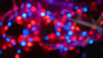 Circle lights bokeh from blue and red lights. Blur the lights to decorate circles to create bokeh for use as background or wallpaper photo