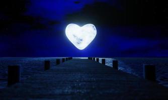 Full moon, heart shape at night was full of stars and a faint mist. A wooden bridge extended into the sea. Fantasy image at night, super moon, sea water wave. 3D Rendering photo