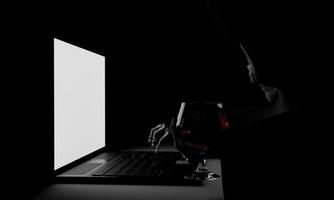 The demon skull or Satan. Black hooded hood. Use the Labtop or Computer Notebook. Blank white screen. Wine glass in the bone hand. 3D Rendering photo