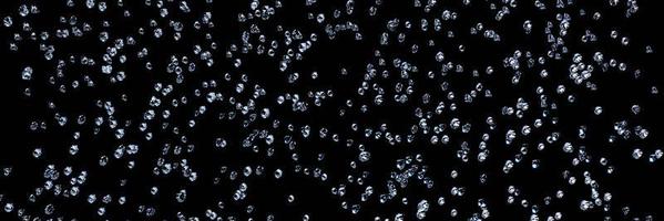 Lots of diamonds of various sizes falling from above with a black background to use as background or wallpaper . 3D Rendering photo