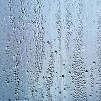 raindrops on the window in rainy days, abstract background photo